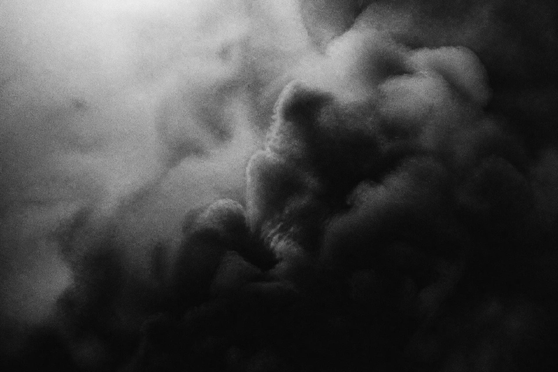 Grainy black and white atmospheric smoke